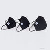 Set of three black protective face masks in pediatric, small, and universal sizes, each with adjustable ear loops and a.