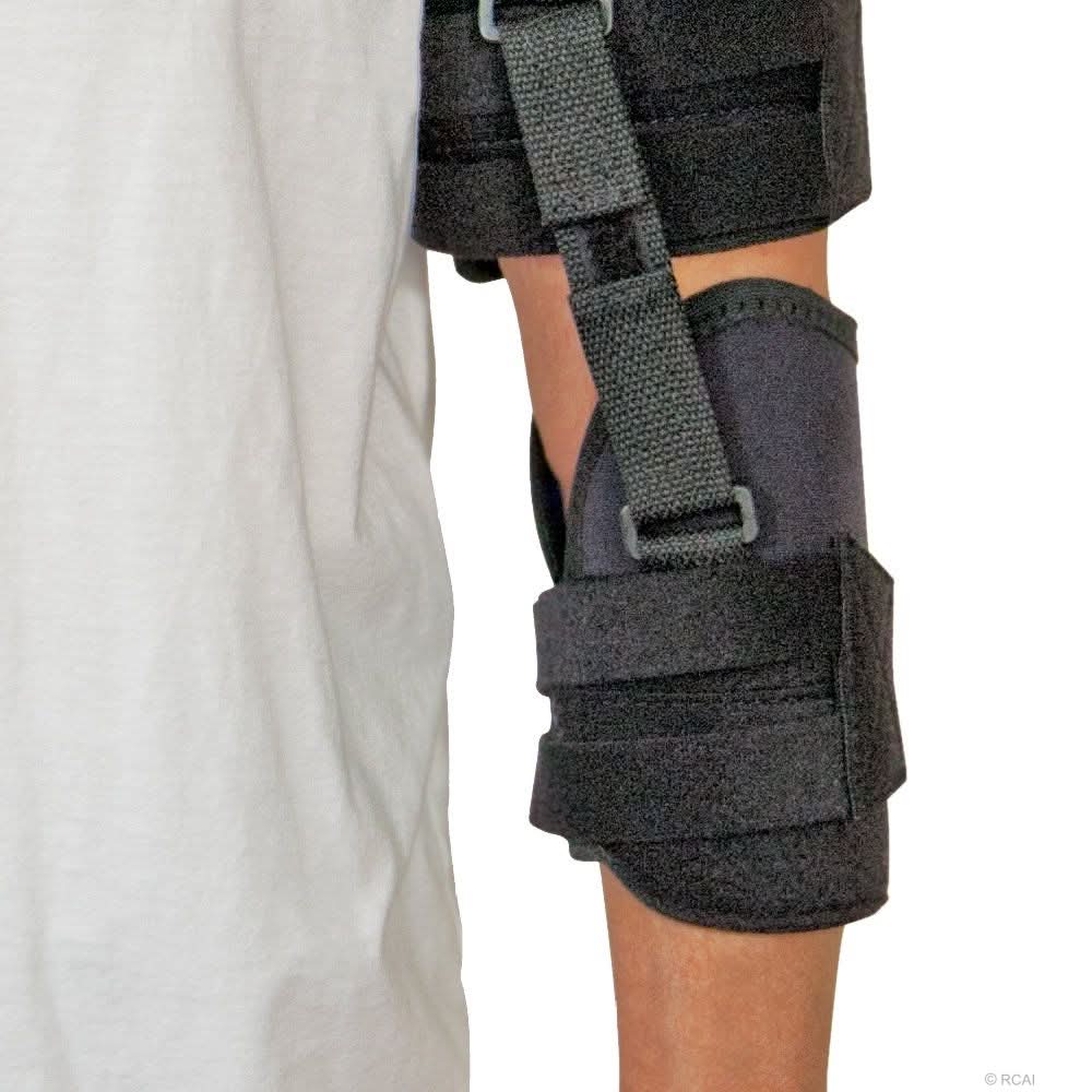 Black neoprene shoulder stabilizer with adjustable straps on arm, made in the USA, best orthopedic braces by RCAI for B2B.