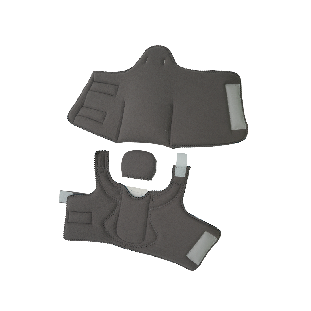 Dark gray orthopedic brace accessory kit with adjustable straps and soft padding, made in the USA by RCAI, ideal for B2B.