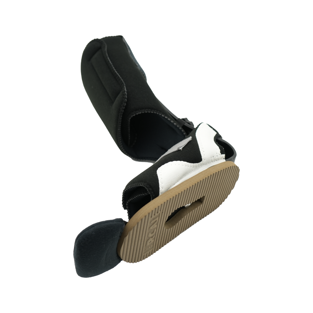 Black RCAI MPO 2000® ankle brace with ambulatory attachment, beige rubber sole, made in the USA, best orthopedic braces for.