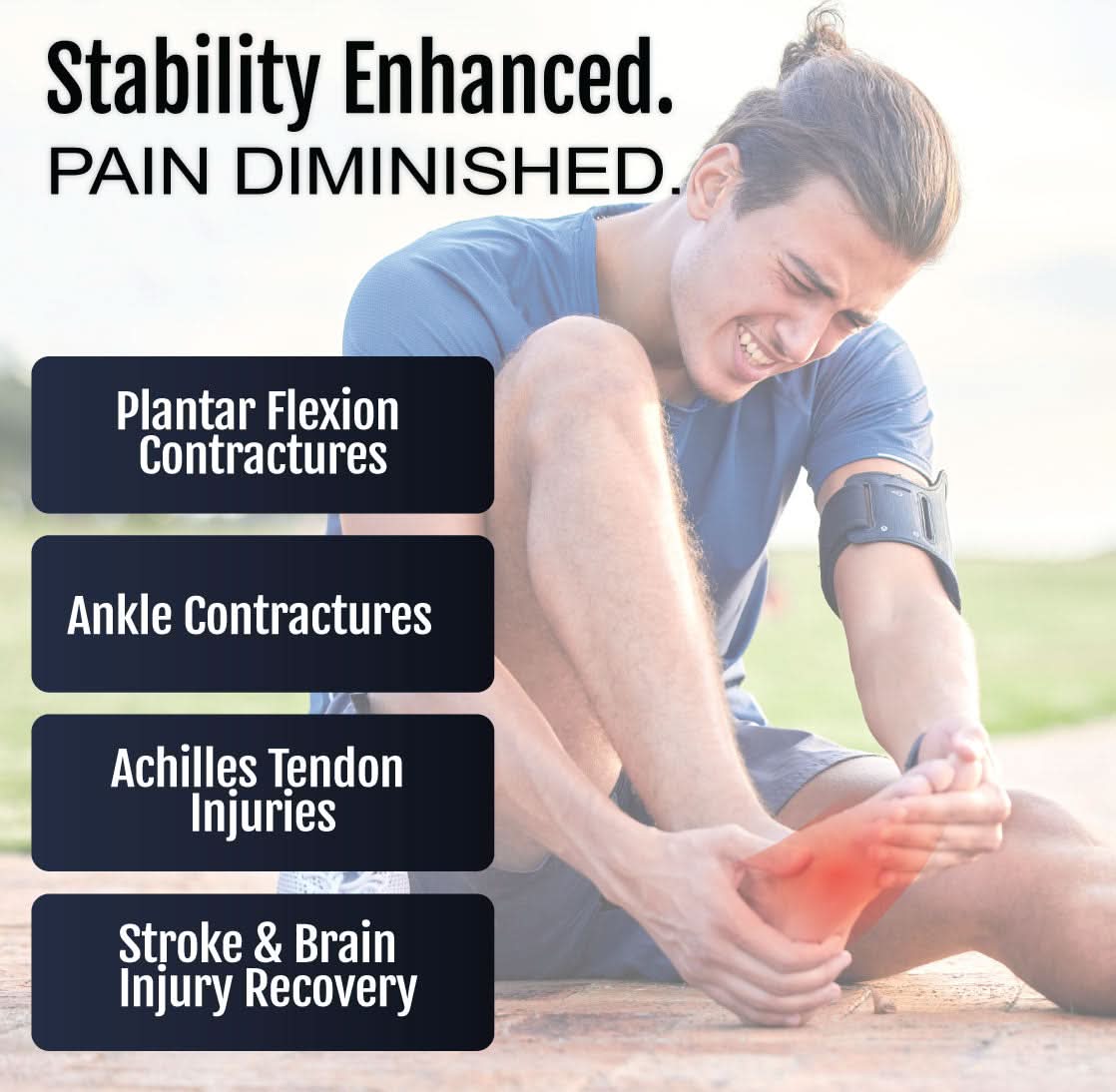 Man in blue long-sleeve shirt and gray shorts holding his red foot, highlighting pain areas for plantar flexion.