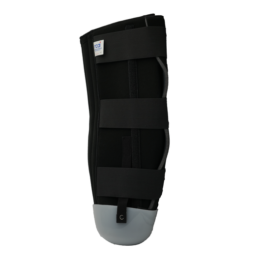 Black below-knee amputee rigid dressing protector with three adjustable straps and gray reinforced bottom panel, made in the .