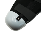 Below knee amputee rigid dressing protector with glossy white single panel and black adjustable straps, made in the USA by.