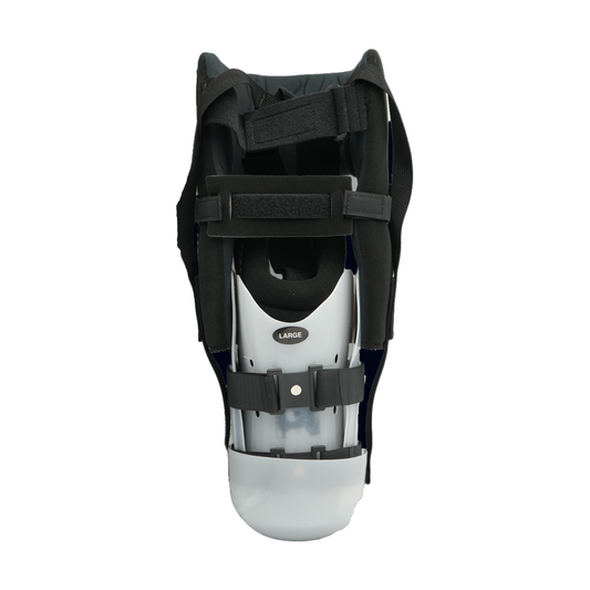 Respond ROM BKA rigid dressing in black and white with adjustable velcro straps, made in the USA, best orthopedic braces by.