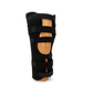 Black RCAI knee immobilizer with adjustable wide straps and breathable padding on a display leg, made in the USA, best.