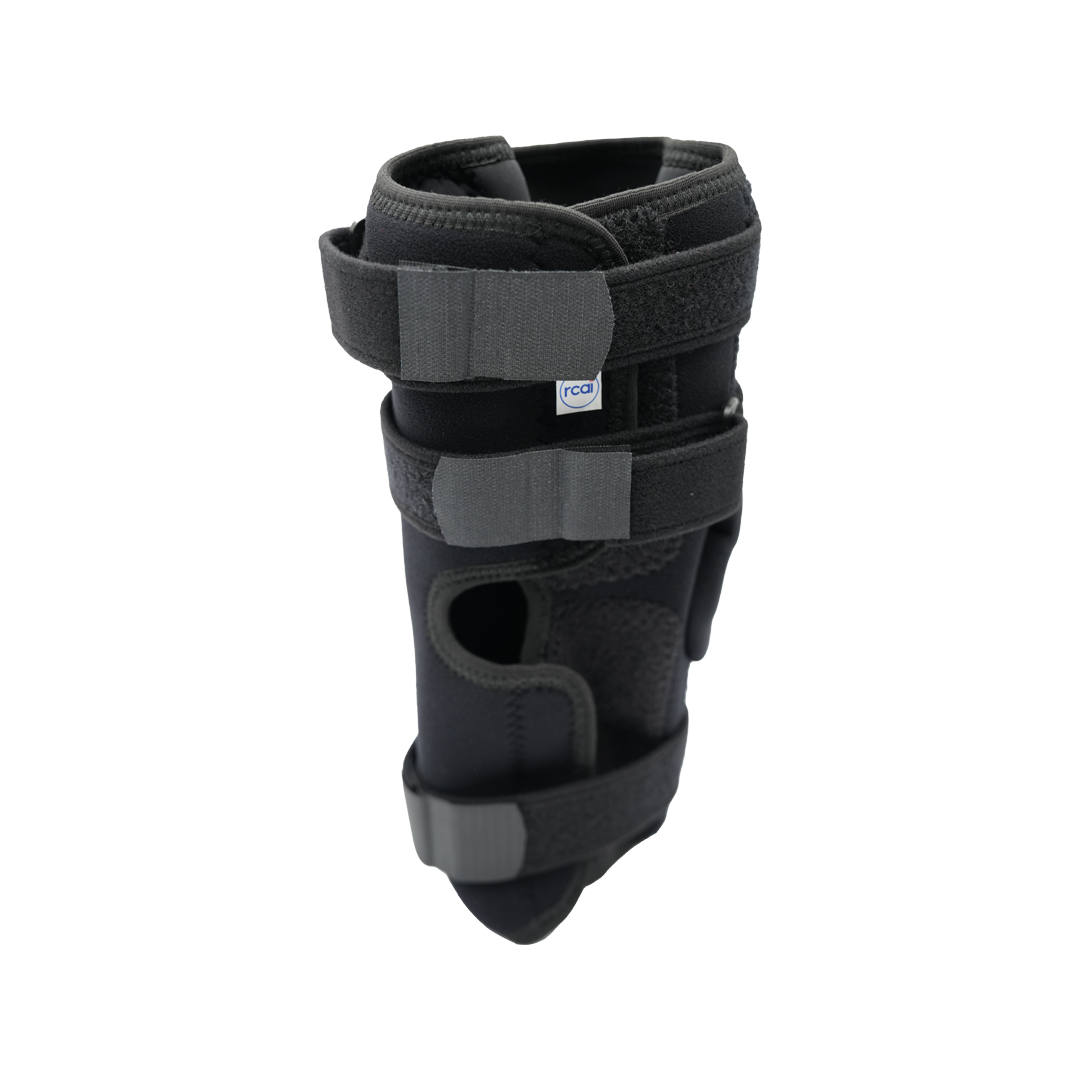 Black RCAI Deluxe Wrap Knee brace with adjustable Velcro straps, breathable fabric, and reinforced support, made in the USA, .