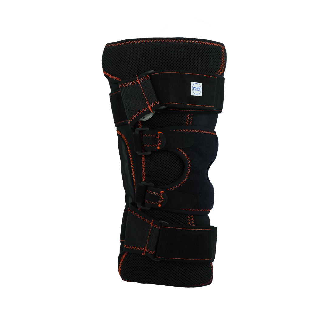 Black orthopedic knee brace with bright orange stitching, multiple adjustable straps, and padded support panels.