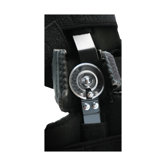 Close-up of black Flex Pop Elbow brace hinge mechanism with metal adjustment dial, made in the USA, best orthopaedic braces.