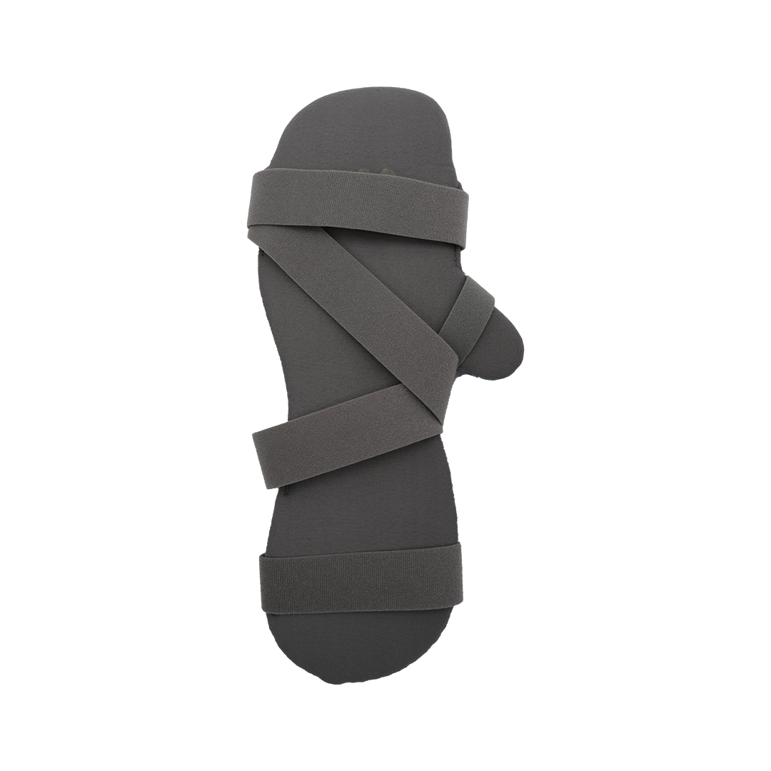 Gray finger extension orthosis with three adjustable Velcro straps and padded material, designed for hand support.