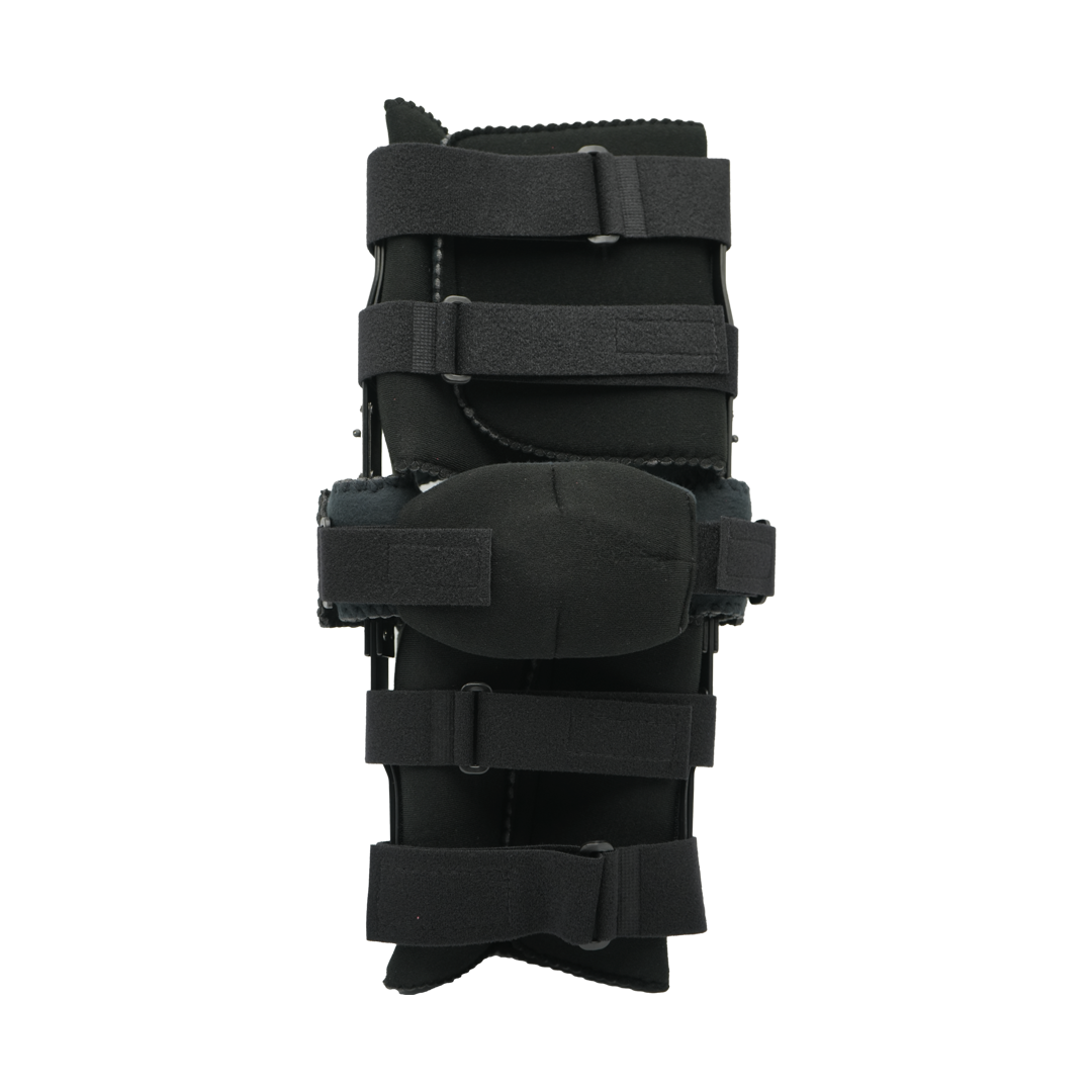 Black adjustable ratchet post-operative knee brace with multiple wide straps and cushioned knee pad, lightweight design made .