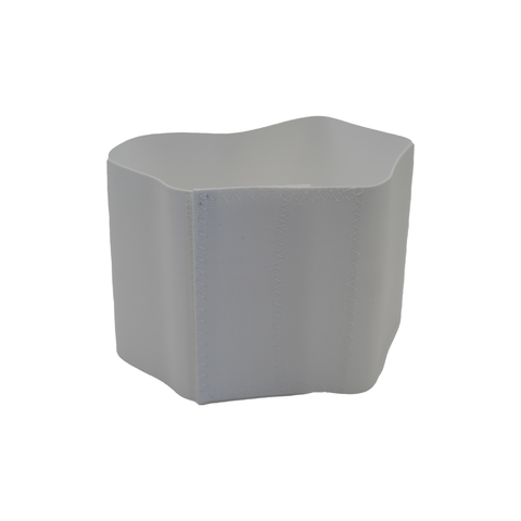 White pediatric abdominal binder with smooth, stretchy fabric and reinforced vertical stitching, designed for comfortable.