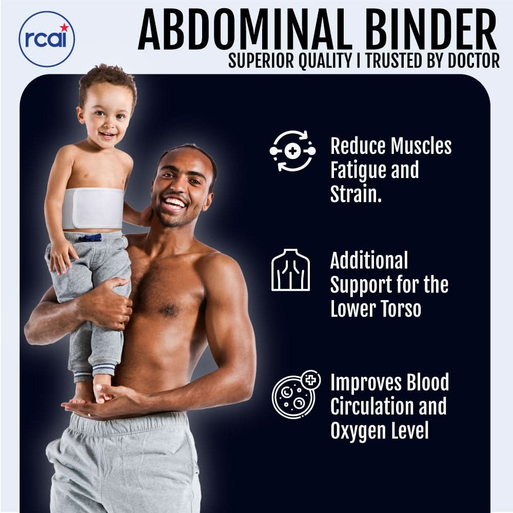 Smiling toddler wearing white RCAI pediatric abdominal binder around torso, worn by a man holding the child, showcasing soft .