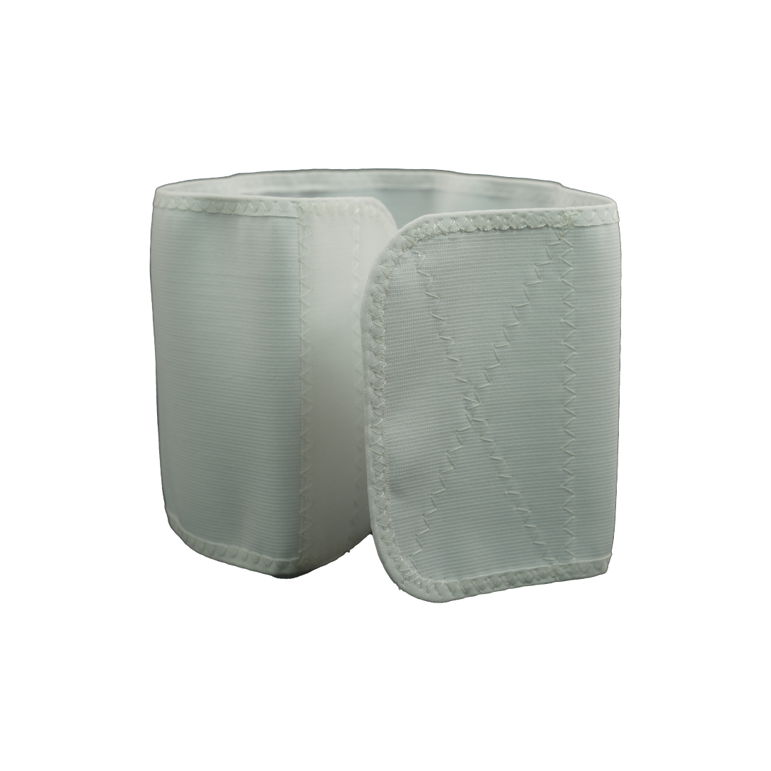 Soft white pediatric abdominal binder with adjustable wide hook-and-loop closure and quilted stitching for medical support.