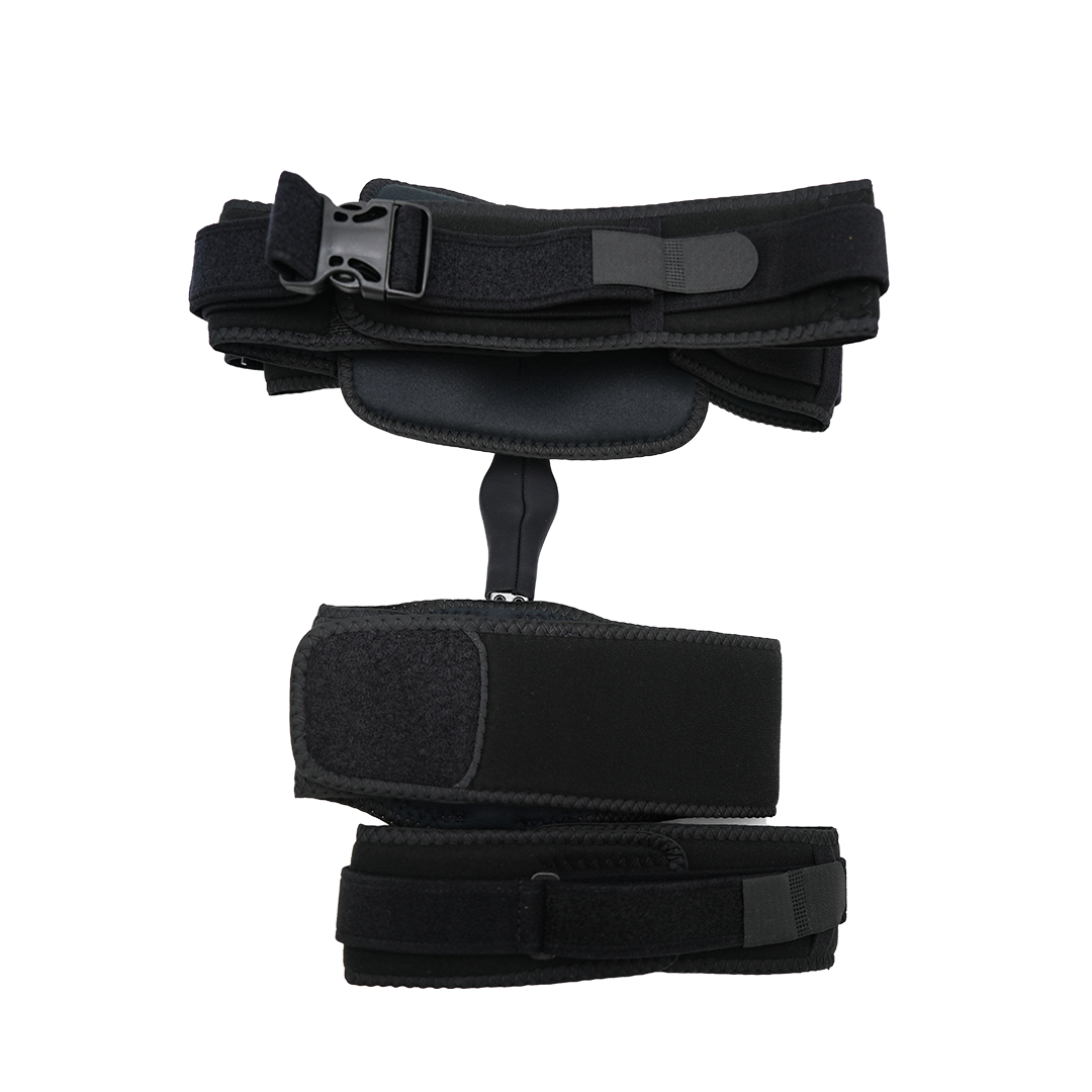 Black hip abduction orthosis accessory kit with adjustable padded straps and plastic buckle, lightweight design, made in the