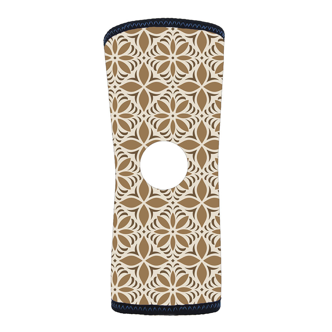 Beige and white patterned infant knee sleeve with central open patella design, made in the USA, RCAI best orthopedic brace.