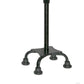 Black TotalUp adjustable self-standing cane with four rubber-tipped legs, sturdy base designed for stability, made in the.