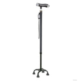 Black adjustable self-standing cane with ergonomic white and black handle, quad base for stability, made in the USA, ideal.