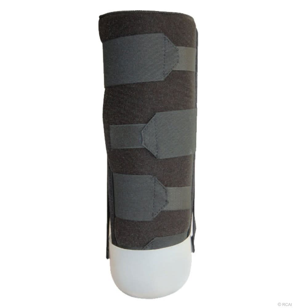 Below knee amputee rigid dressing protector in dark gray with three wide adjustable straps, made in the USA by RCAI, top.