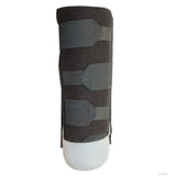 Below knee amputee rigid dressing protector in dark gray with three wide adjustable Velcro straps, made in the USA, rcai.