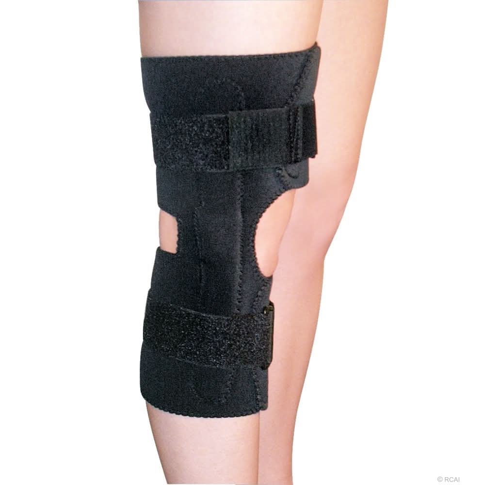 Black neoprene wrap-around knee brace with covered hinge, adjustable Velcro straps, worn on bent leg, made in the USA, best.